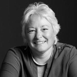 Dr. Karen Jaenke, smiling in a B&W photo.