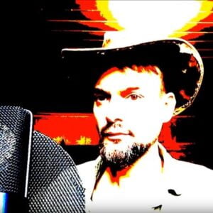 A man in a cowboy hat, Al Borealis, confidently holds a microphone, ready to captivate his audience. 